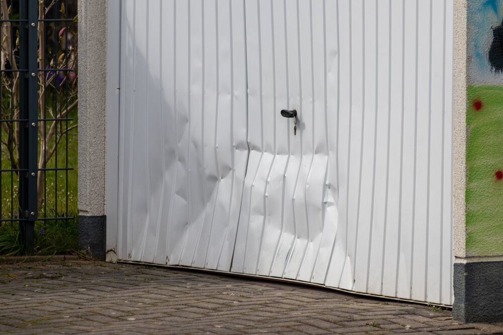 What to Do When You Damage Your Garage Door